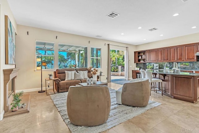 10495 Abalone Lndg, San Diego, CA 92130 - living room with baseboards, recessed lighting, and light tile patterned floors