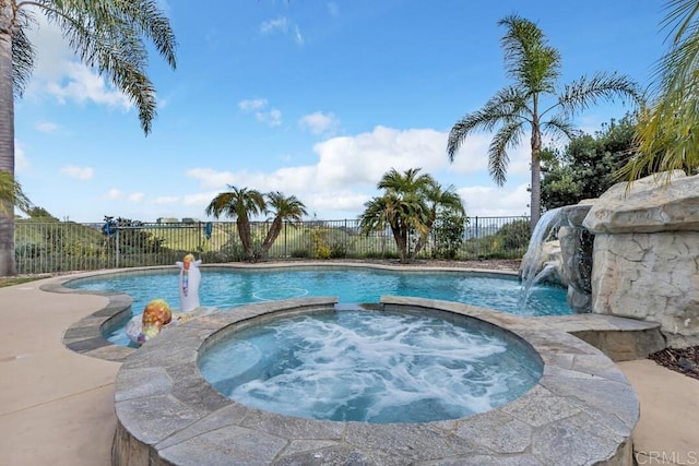 10495 Abalone Lndg, San Diego, CA 92130 - view of swimming pool featuring a pool with connected hot tub and fence