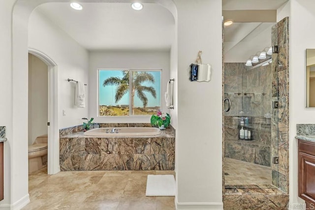 10495 Abalone Lndg, San Diego, CA 92130 - bathroom with a shower stall, vanity, a garden tub, toilet, and recessed lighting