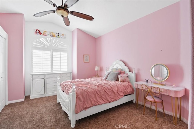 bedroom with lofted ceiling, carpet flooring, baseboards, and a ceiling fan