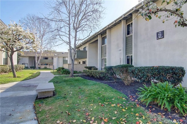 8566 Van Ness Ct Unit 21D, Huntington Beach, CA 92646 - surrounding community with a yard