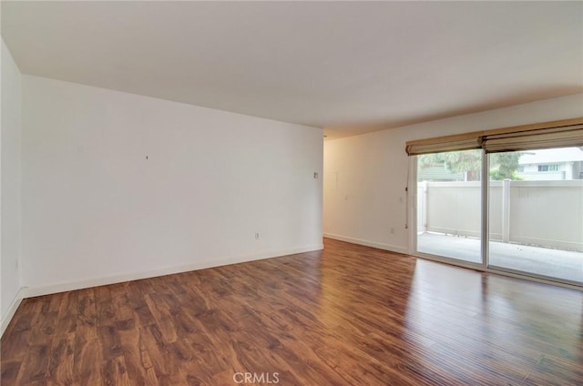 8566 Van Ness Ct Unit 21D, Huntington Beach, CA 92646 - empty room featuring wood finished floors and baseboards