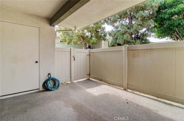 8566 Van Ness Ct Unit 21D, Huntington Beach, CA 92646 - view of patio featuring a gate