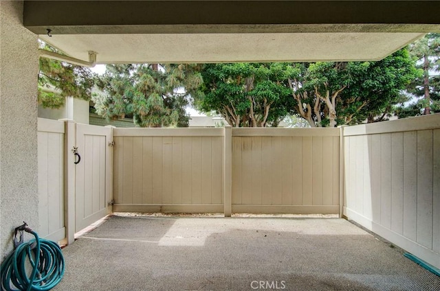 8566 Van Ness Ct Unit 21D, Huntington Beach, CA 92646 - view of patio with a gate