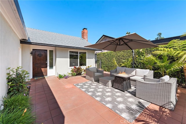 22665 Ancona, Laguna Hills, CA 92653 - view of patio / terrace with an outdoor living space with a fire pit