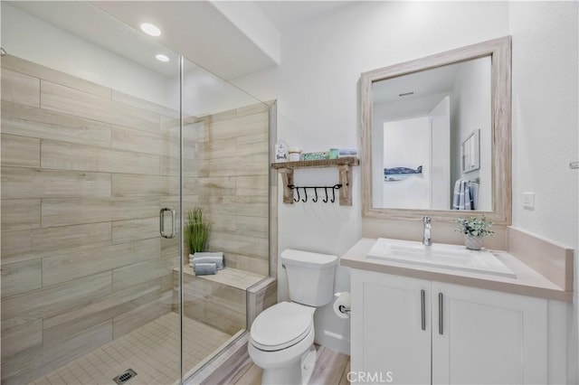116 Via Bilbao, San Clemente, CA 92672 - bathroom featuring a stall shower, toilet, and vanity