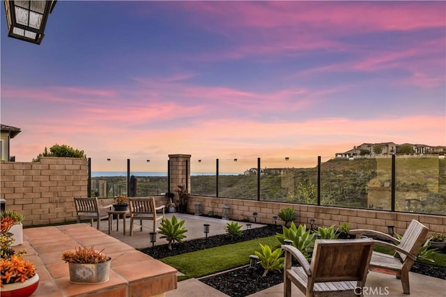 view of patio / terrace with fence