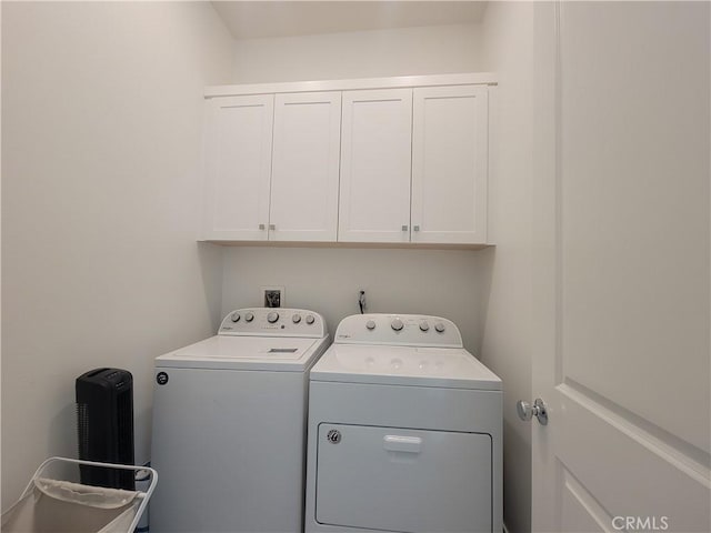27078 Painted Sky Way, Valencia, CA 91381 - laundry area featuring washer and clothes dryer and cabinet space