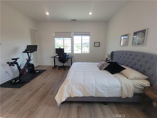 27078 Painted Sky Way, Valencia, CA 91381 - bedroom featuring wood finished floors, recessed lighting, and an office area