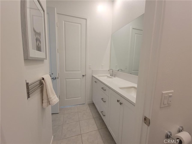 27078 Painted Sky Way, Valencia, CA 91381 - bathroom with tile patterned flooring, double vanity, and baseboards