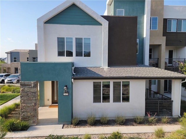 27078 Painted Sky Way, Valencia, CA 91381 - contemporary house featuring stucco siding and a shingled roof