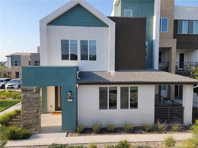 27078 Painted Sky Way, Valencia, CA 91381 - contemporary home with stucco siding and roof with shingles