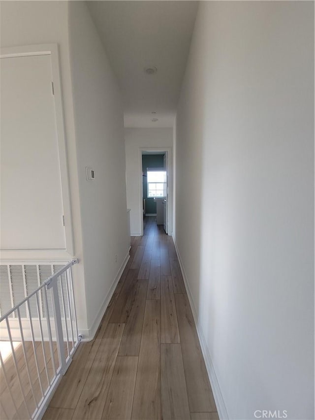27078 Painted Sky Way, Valencia, CA 91381 - hall with light wood-style floors and baseboards