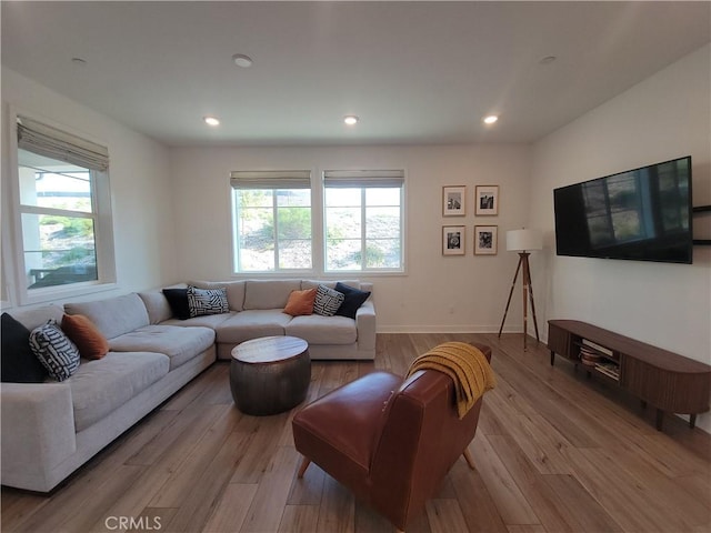 27078 Painted Sky Way, Valencia, CA 91381 - living area with plenty of natural light, wood finished floors, recessed lighting, and baseboards