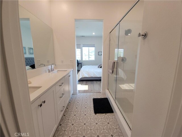 27078 Painted Sky Way, Valencia, CA 91381 - ensuite bathroom with a stall shower, tile patterned flooring, and double vanity