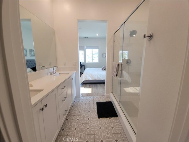 27078 Painted Sky Way, Valencia, CA 91381 - ensuite bathroom with tile patterned floors, a stall shower, and double vanity