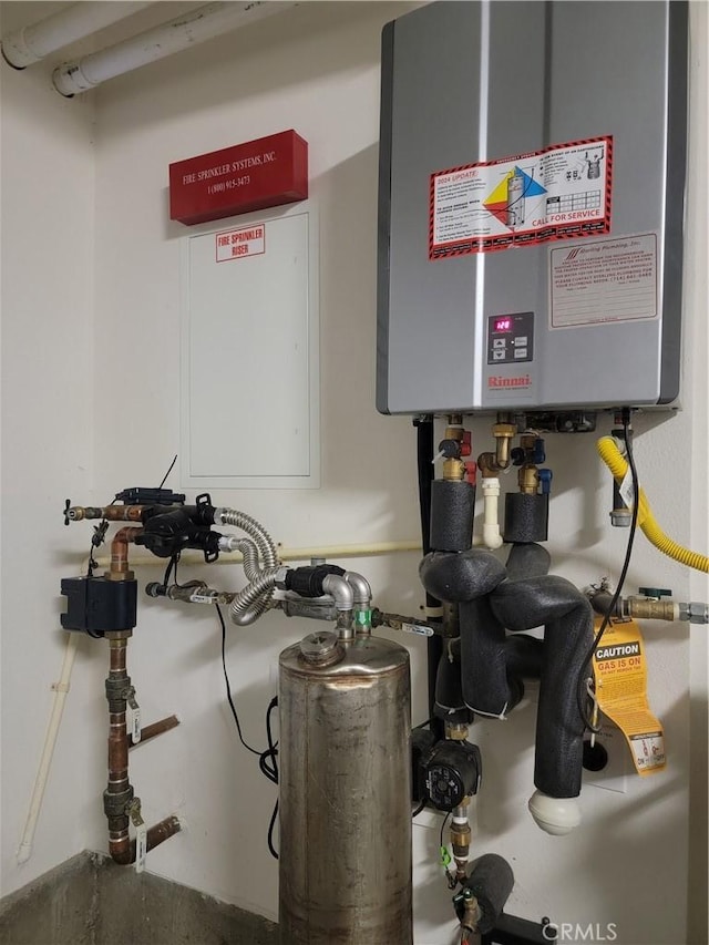 27078 Painted Sky Way, Valencia, CA 91381 - utility room featuring tankless water heater