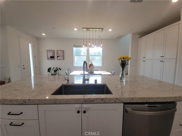 27078 Painted Sky Way, Valencia, CA 91381 - kitchen featuring stainless steel dishwasher, a sink, white cabinetry, light stone counters, and recessed lighting
