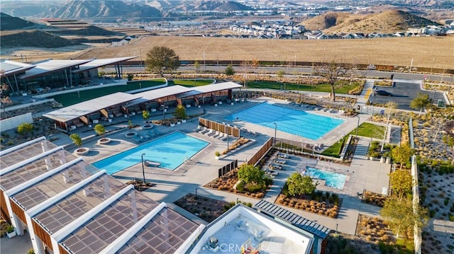 27078 Painted Sky Way, Valencia, CA 91381 - aerial view of a pool and a mountain backdrop