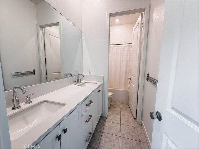 27078 Painted Sky Way, Valencia, CA 91381 - bathroom with toilet, tile patterned flooring, double vanity, and shower / tub combo with curtain