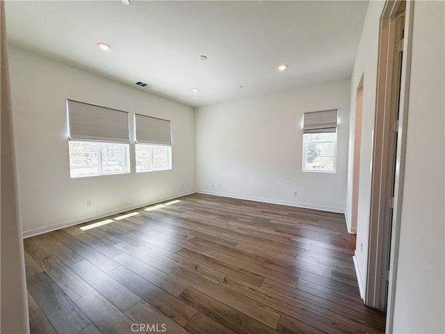 27078 Painted Sky Way, Valencia, CA 91381 - empty room with dark wood finished floors, baseboards, and recessed lighting
