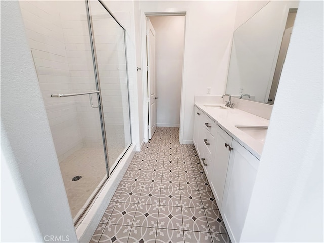 27078 Painted Sky Way, Valencia, CA 91381 - bathroom with a stall shower, double vanity, and baseboards