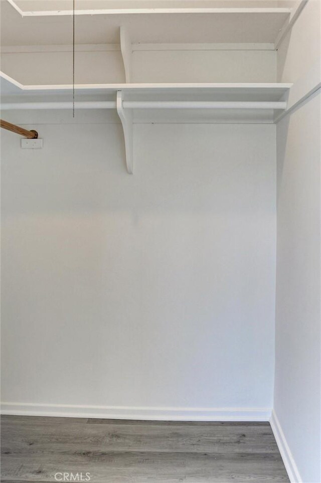 4343 Finley Ave Unit 35, Los Angeles, CA 90027 - walk in closet featuring wood finished floors