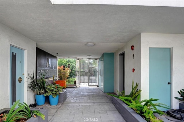 4343 Finley Ave Unit 35, Los Angeles, CA 90027 - doorway to property with a gate and stucco siding