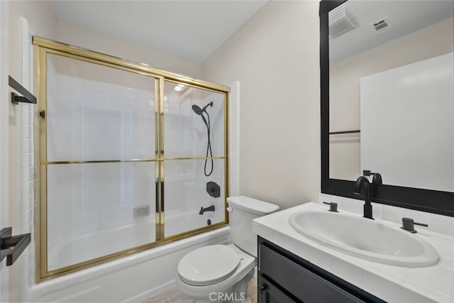 full bath with enclosed tub / shower combo, visible vents, toilet, and vanity