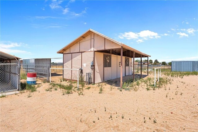 view of outbuilding with an exterior structure and an outdoor structure