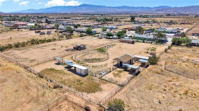 bird's eye view with view of desert, a rural view, and a mountain view