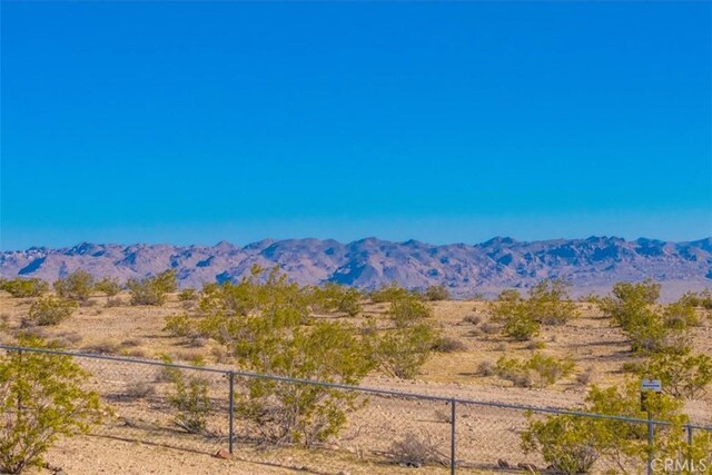 property view of mountains with a desert view and a rural view