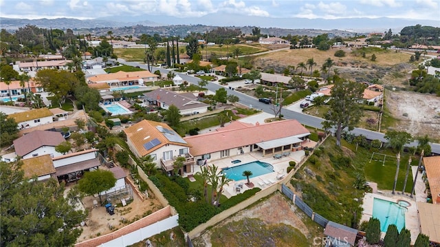 bird's eye view featuring a mountain view and a residential view