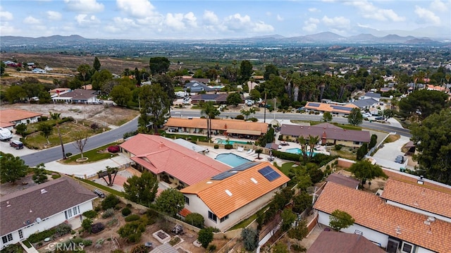 birds eye view of property featuring a residential view and a mountain view