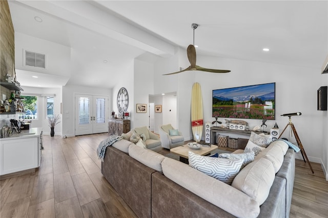 38101 Stone Meadow Dr, Murrieta, CA 92562 - living area featuring high vaulted ceiling, a ceiling fan, wood finished floors, baseboards, and visible vents