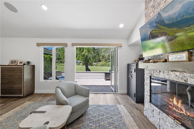 38101 Stone Meadow Dr, Murrieta, CA 92562 - living room with a wealth of natural light, wood finished floors, and a fireplace