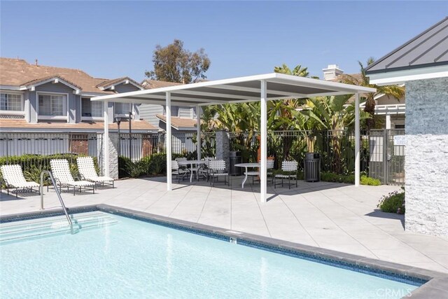 2196 Evergreen Dr, Tustin, CA 92782 - community pool featuring fence and a patio