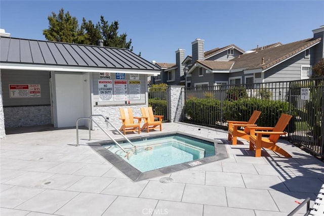 2196 Evergreen Dr, Tustin, CA 92782 - view of pool with a community hot tub and fence