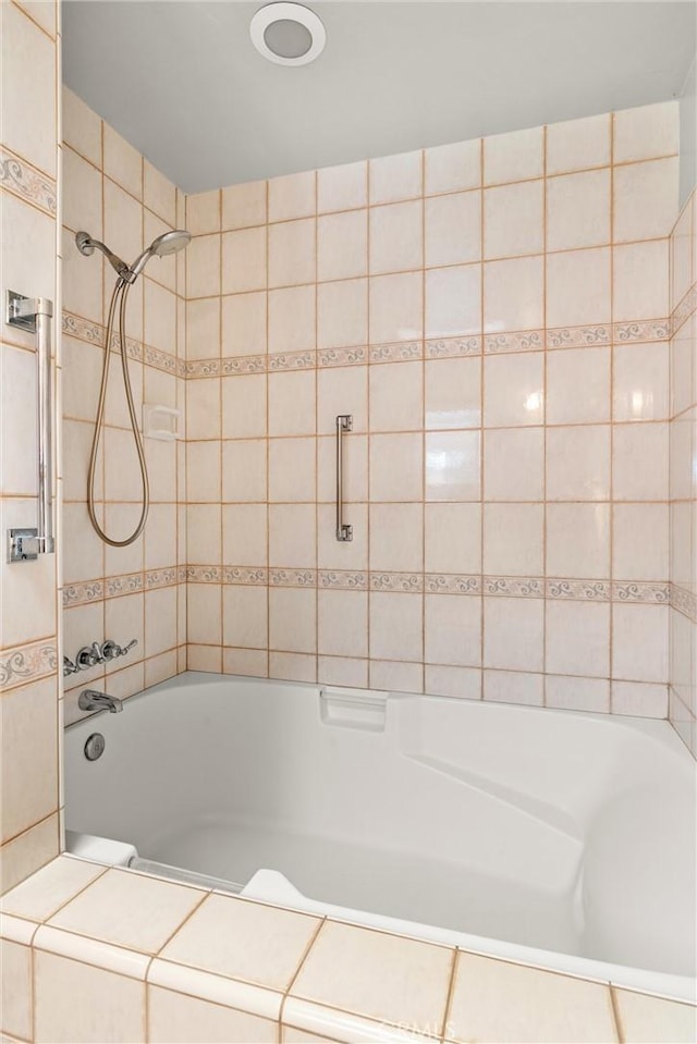 full bath featuring washtub / shower combination