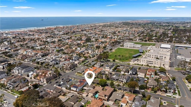birds eye view of property with a residential view and a water view