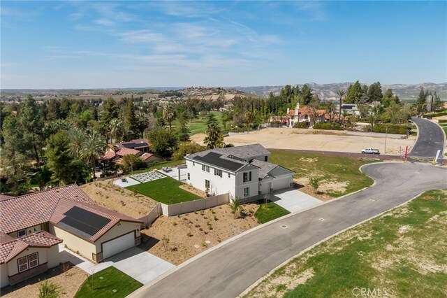 bird's eye view with a residential view and a mountain view