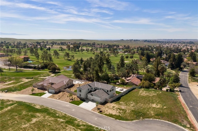 birds eye view of property featuring a residential view and view of golf course