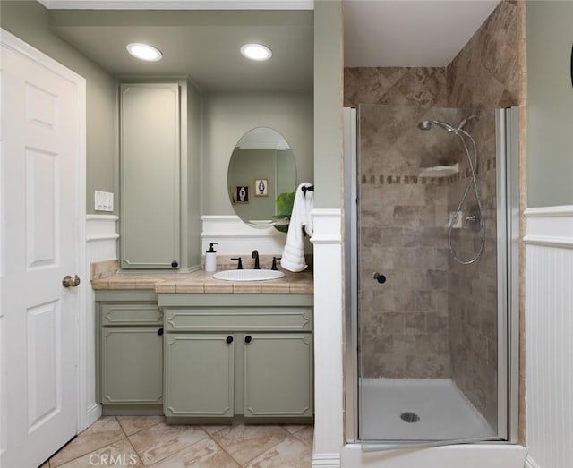 full bathroom with tile patterned floors, vanity, recessed lighting, and a stall shower