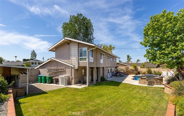 back of house featuring a patio, area for grilling, stucco siding, a yard, and a fenced backyard