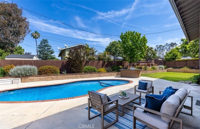 view of pool featuring a fenced in pool, a patio, an outdoor living space, and a fenced backyard