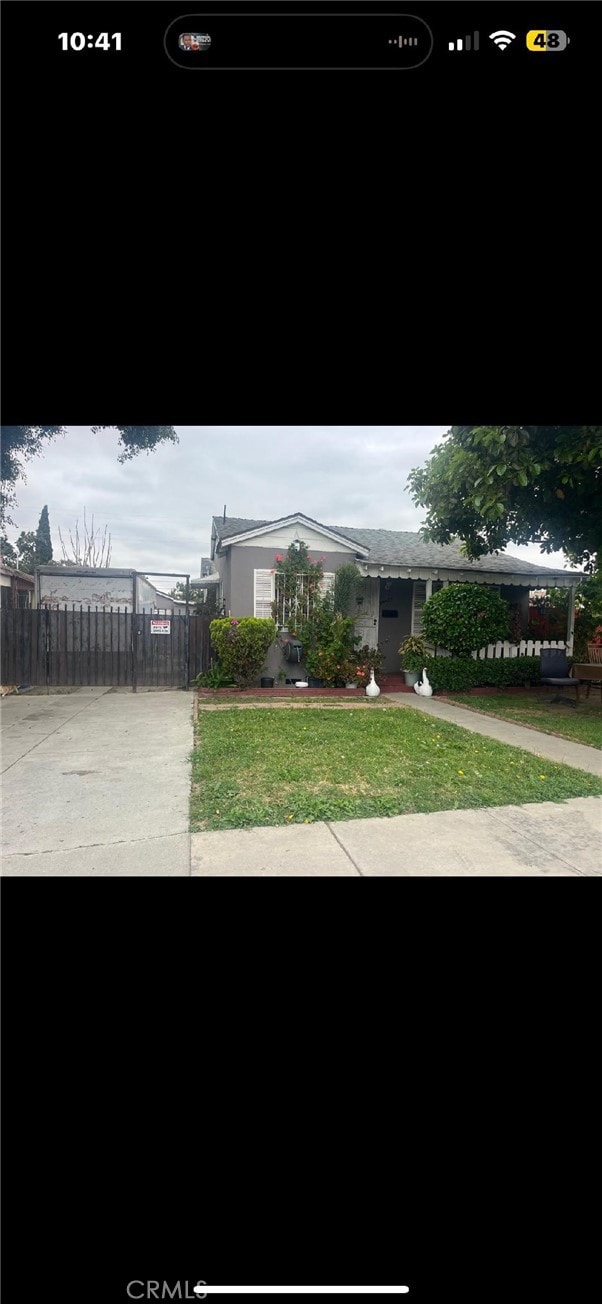 view of front of property with fence