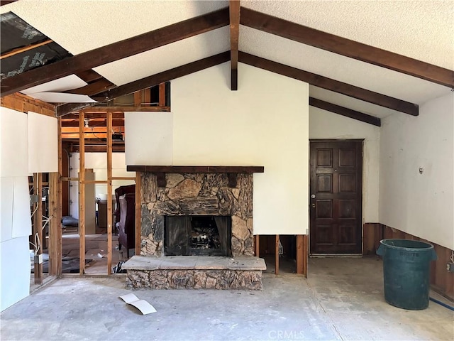 7890 Mariposa Trl, Yucca Valley, CA 92284 - unfurnished living room with a stone fireplace