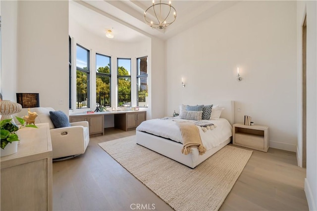 1090 Vista Ridge Ln, Westlake Village, CA 91362 - bedroom with light wood-style floors, a chandelier, and baseboards
