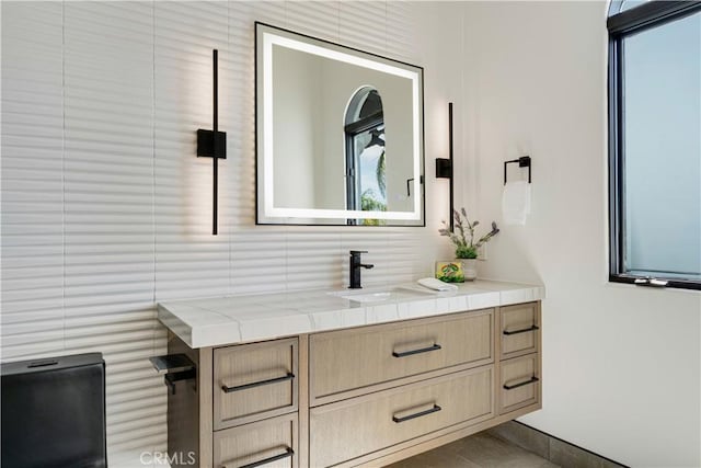 bathroom featuring tile patterned floors and vanity