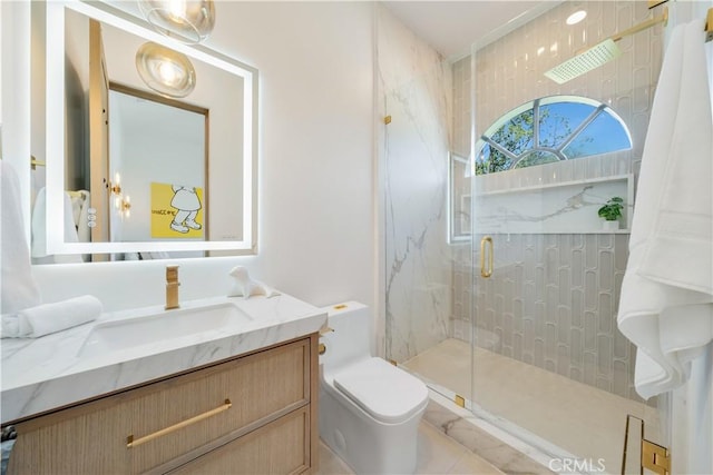 full bath with tile patterned flooring, toilet, vanity, and a marble finish shower